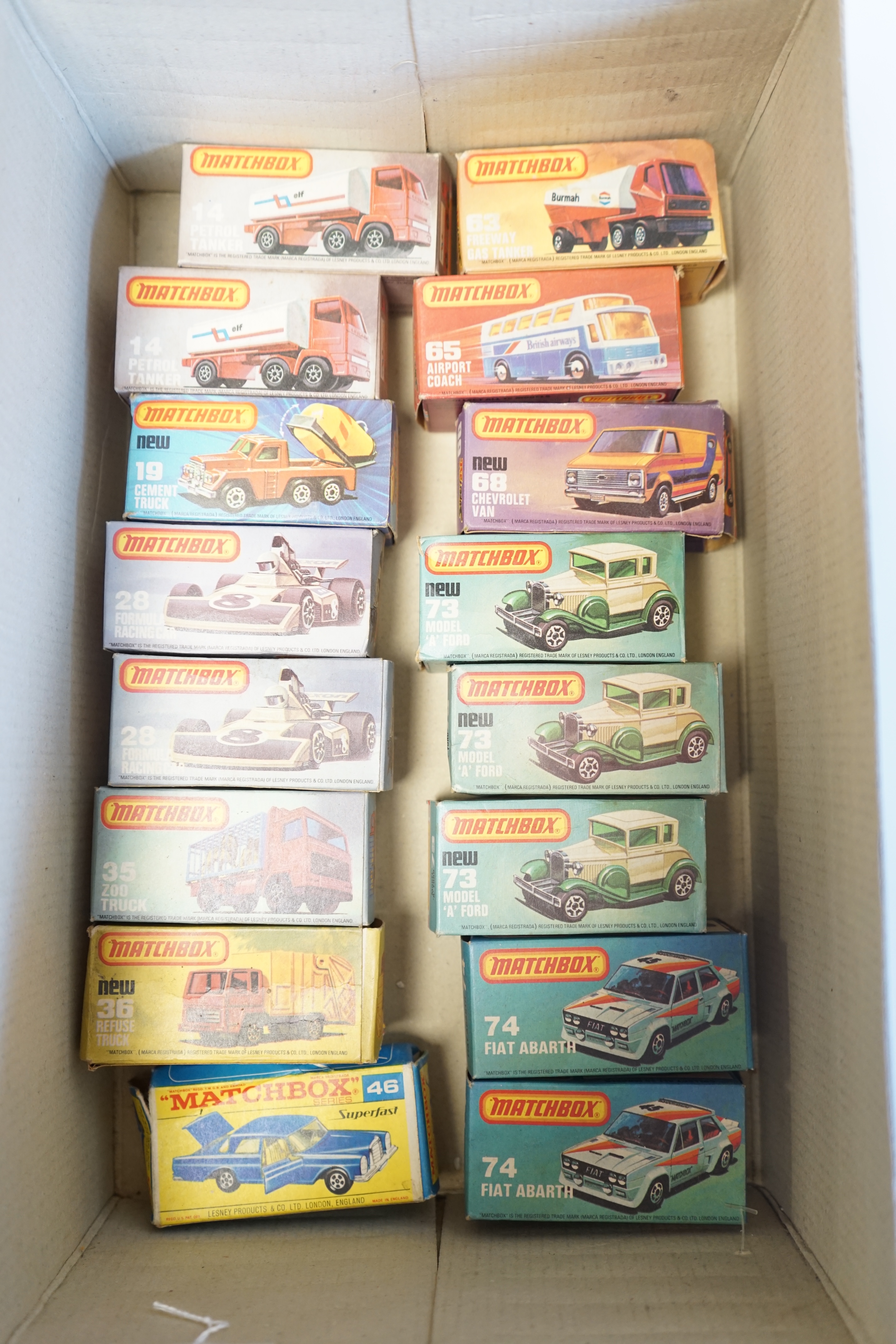 Sixteen boxed Matchbox Series 1-75 diecast vehicles including; 14; Petrol Tanker and another, 19; Cement Truck, 28; Formula Racing Car and another, 35; Zoo Truck, 36; Refuse Truck, 46; Mercedes 300 SE coupe, 63; Freeway